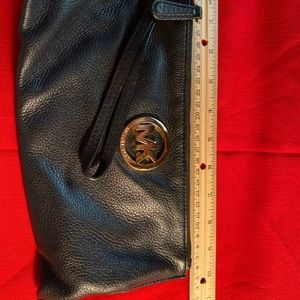 Michael Kors black leather clutch